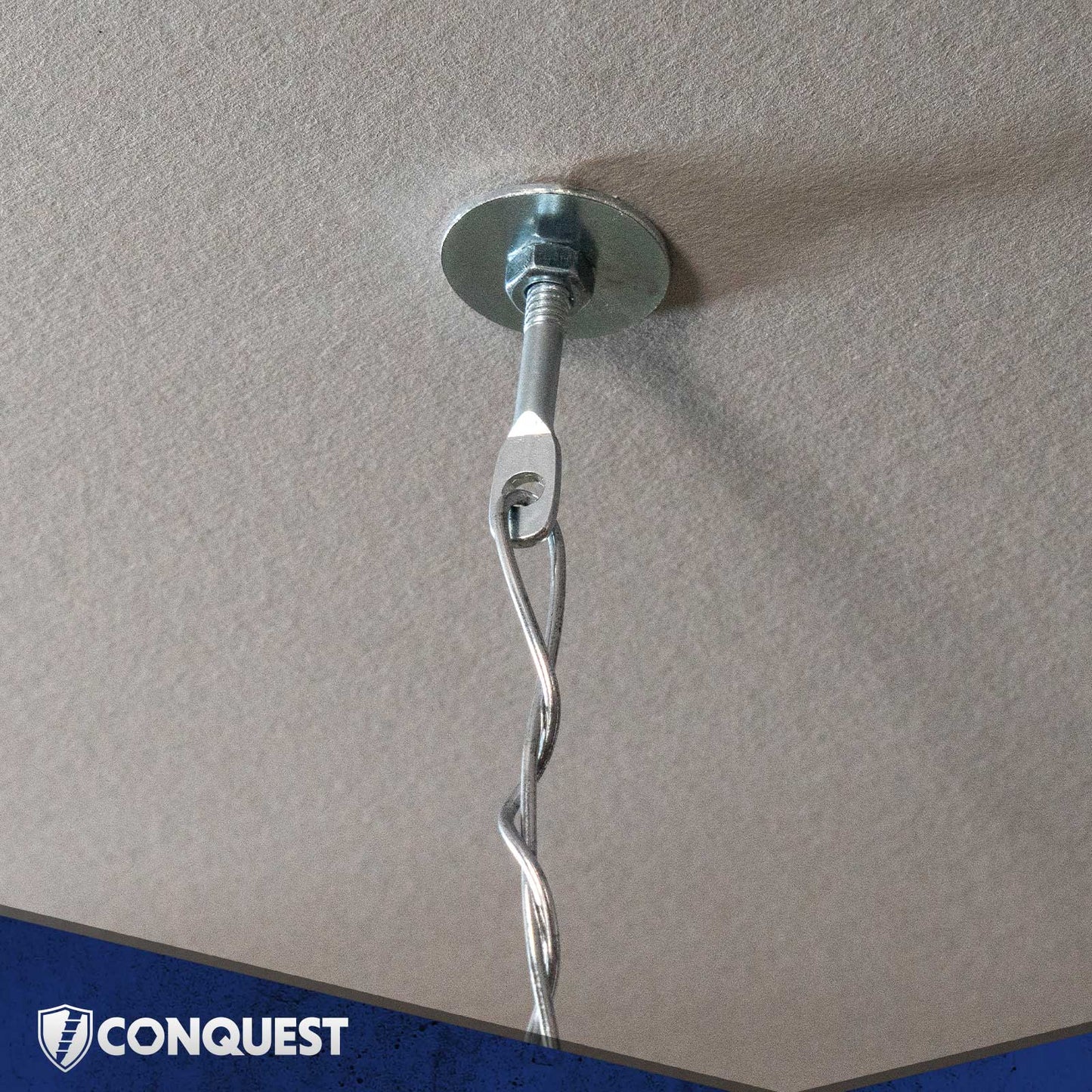 Metal Toggle Bolts attached to a ceiling with wire attached