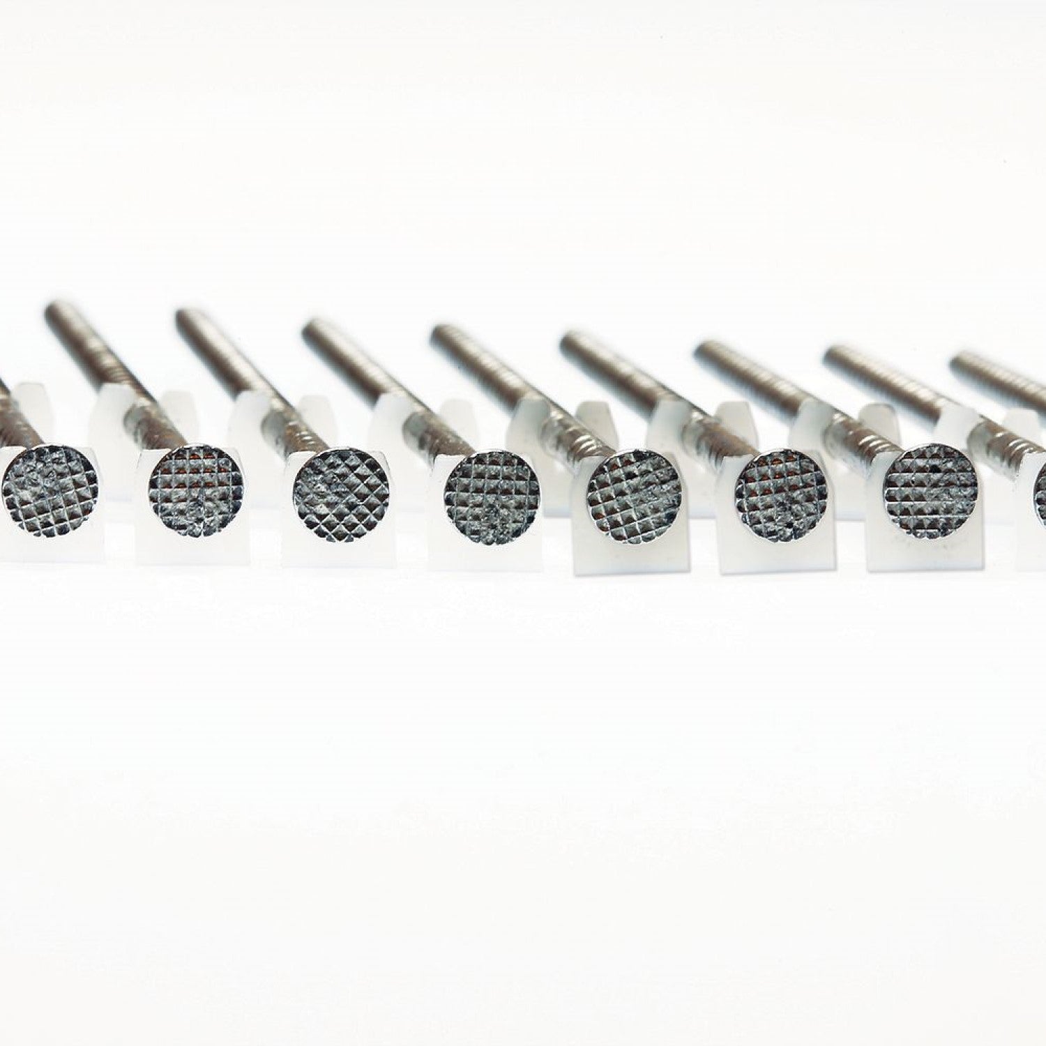 15 Degree Inserted Plastic Coil Ring-Shank Nail Full Round Head Unpainted Shown