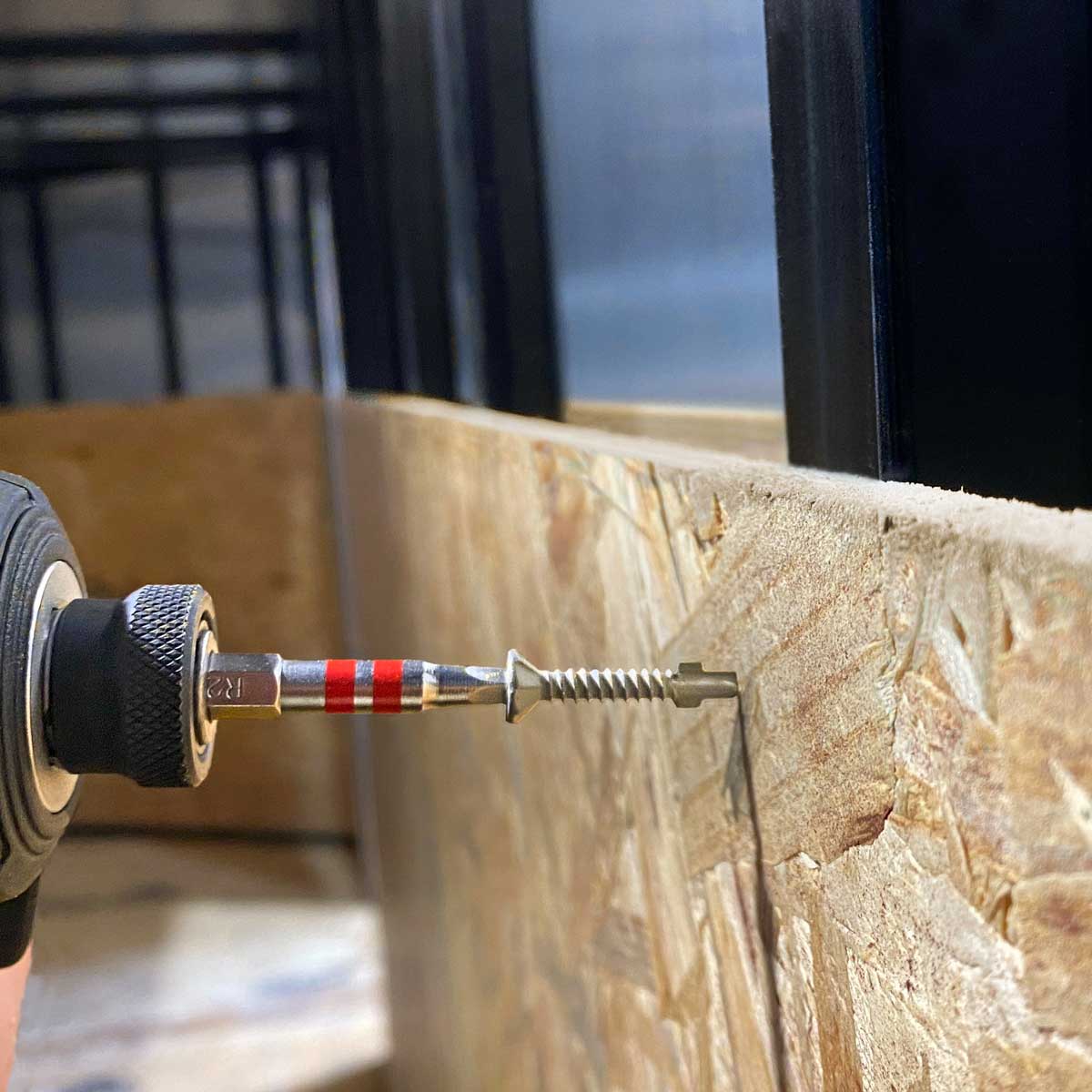 Drill bit being used on plywood