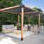 Outdoor patio with pergola, furniture, and plants on a sunny day.