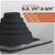 Black metal roof boot with measurement chart on a gray background
