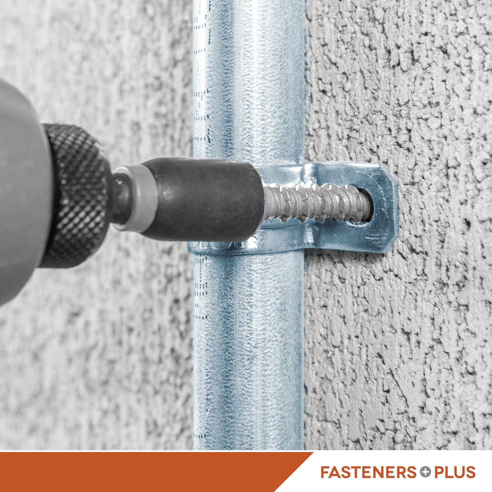 Drill screwing a concrete screw into a concrete wall with 'Fasteners Plus' branding.