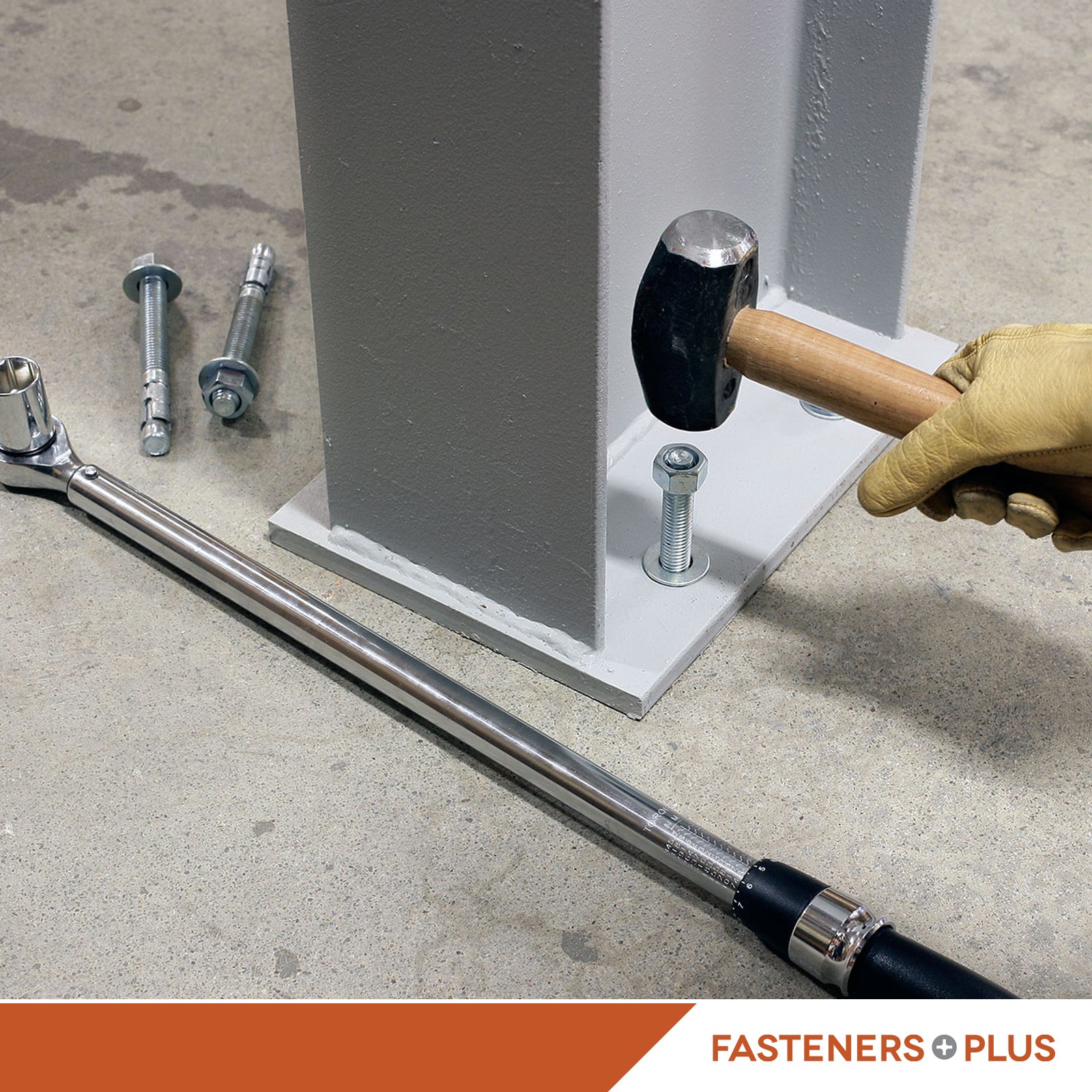 Simpson Strong Bolt 2 Fully Assembled Wedge Anchor - Installed into Concrete Post Base with a Hammer