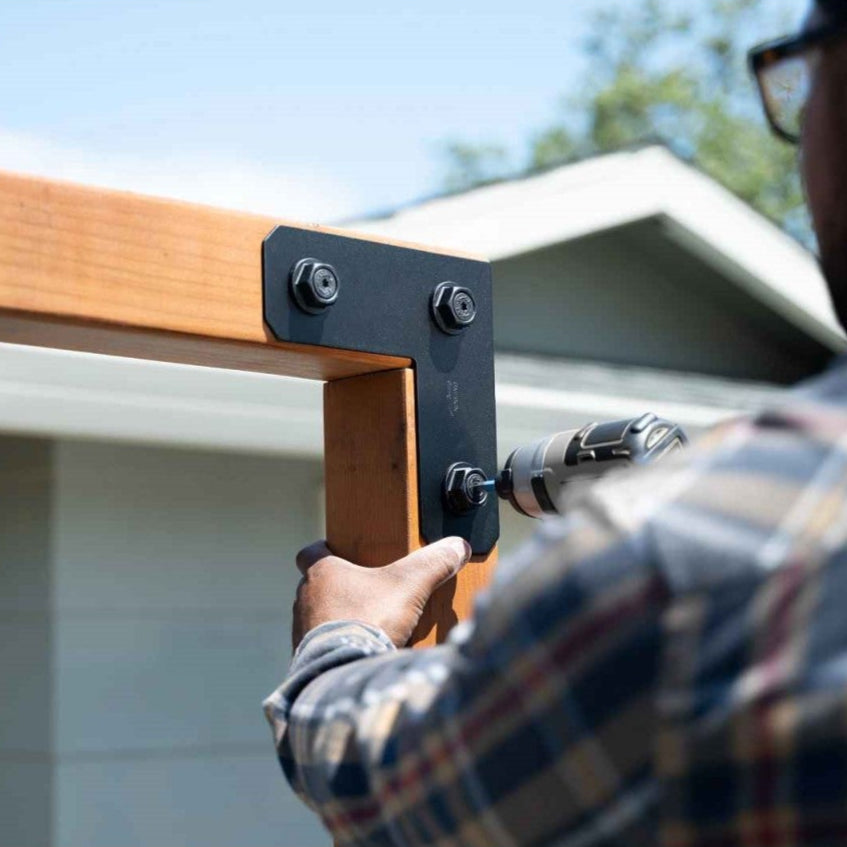 installation of corner bracket for pergola