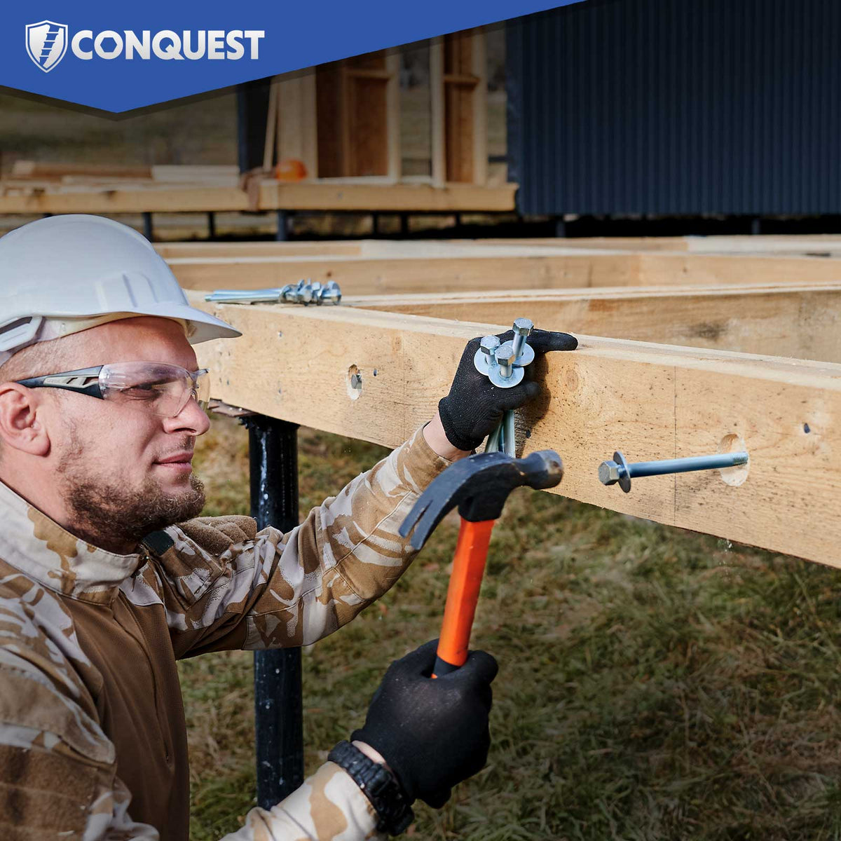 man installing hex bolts