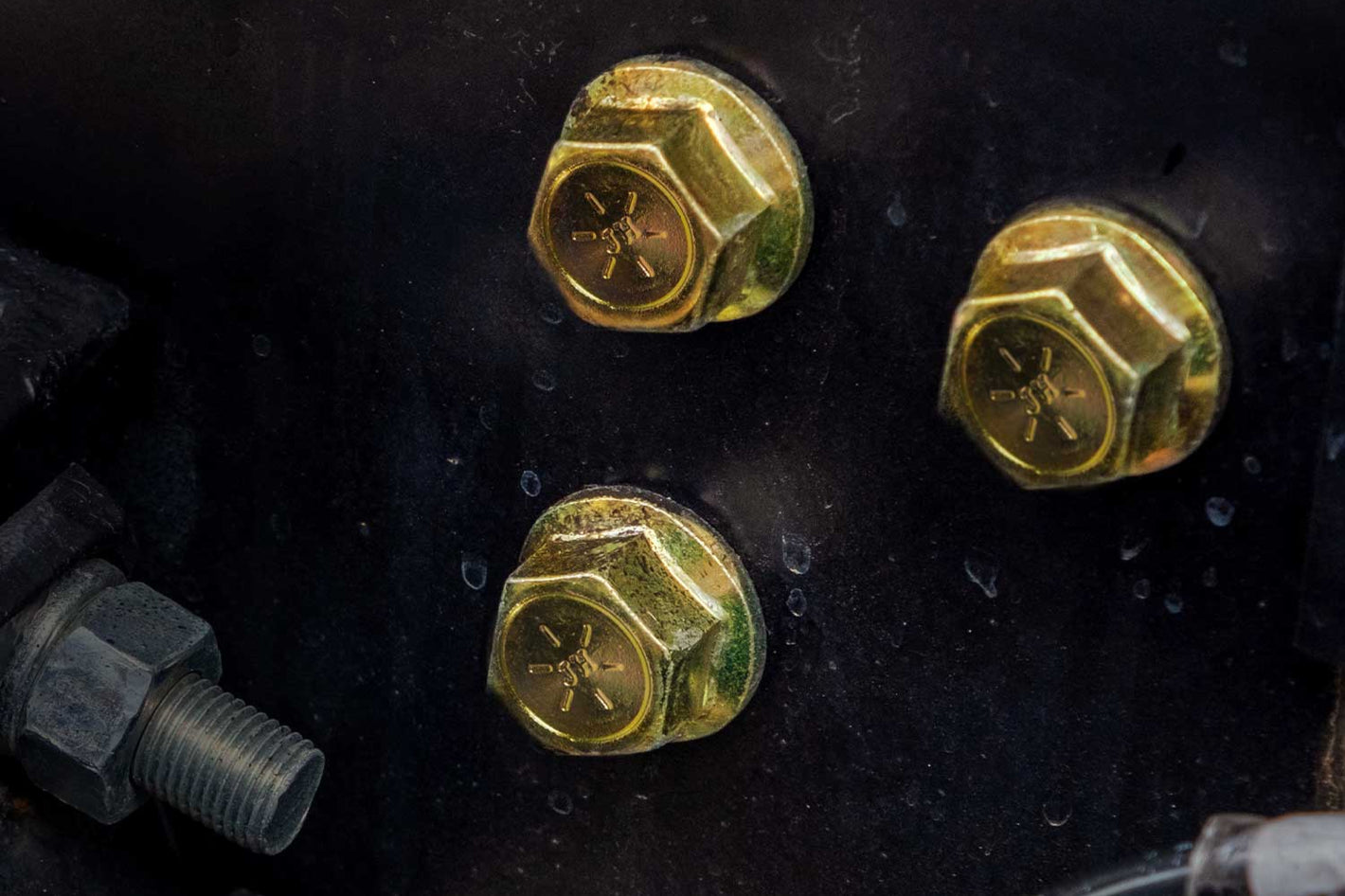 Grade 8 flange bolts installed into metal