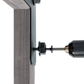 Drill bit being used on a piece of wood with a white background 