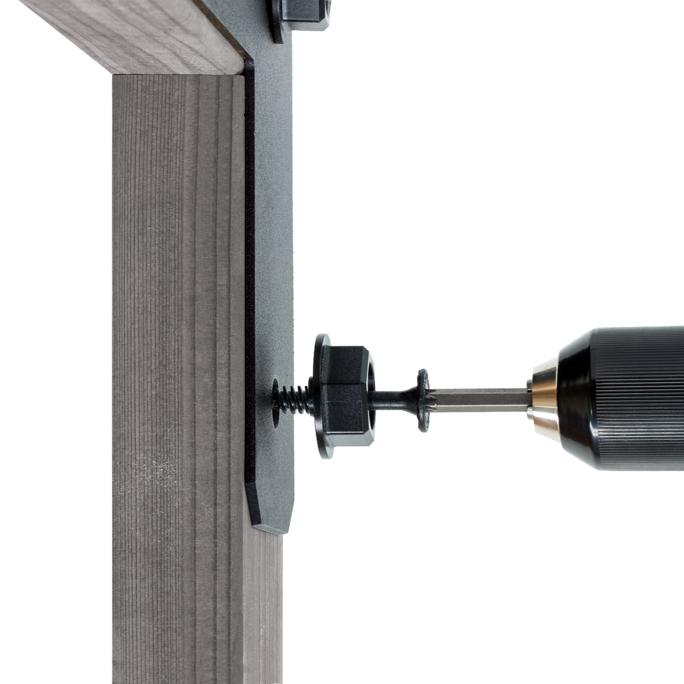 Drill bit being used on a piece of wood with a white background 