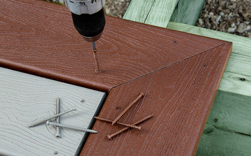 Drilling into a composite deck with deck screws nearby