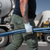 Construction worker carrying a Simpson Anchor Bolts in his hand on a construction site