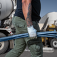 Construction worker carrying a Simpson Anchor Bolts in his hand on a construction site