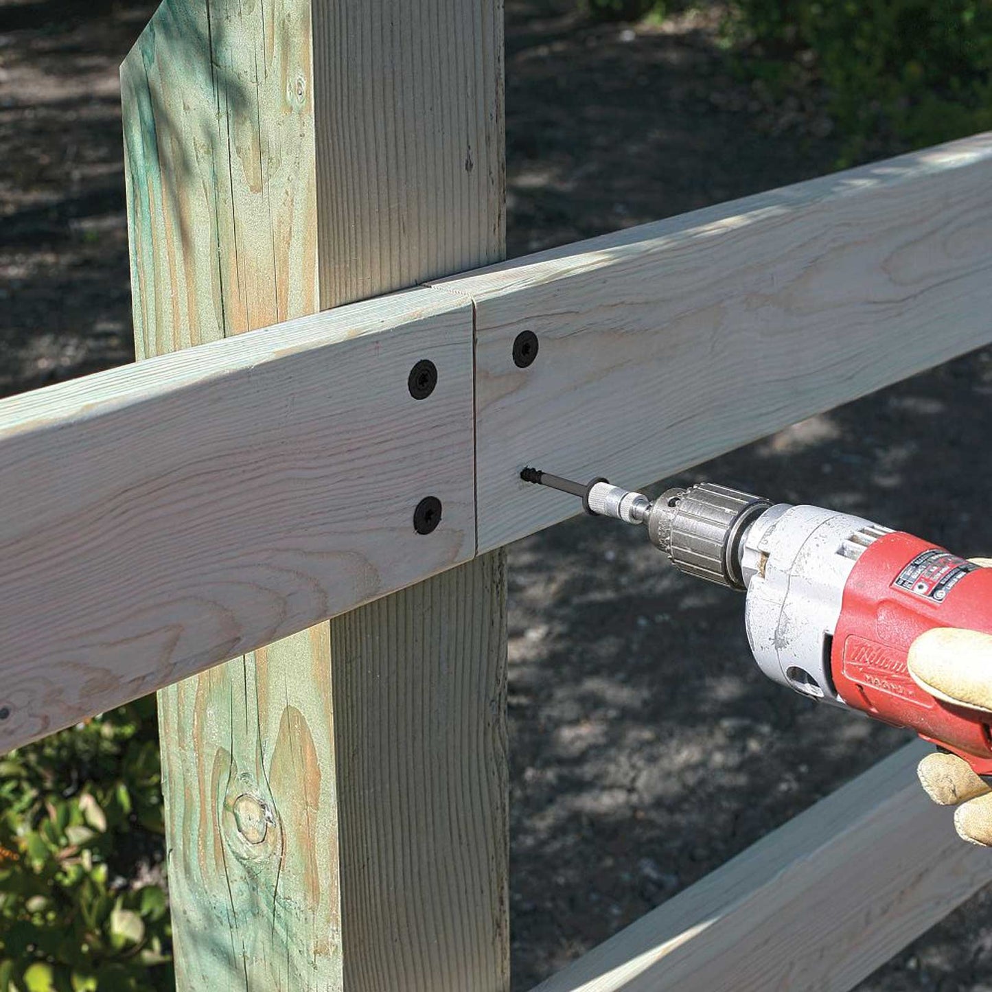 Drilling into wooden beams with black timber screws