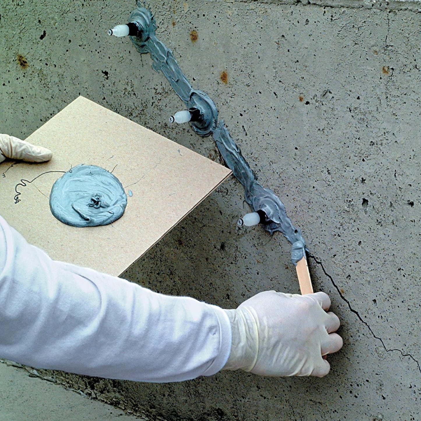 Simpson Strong-Tie CI-LVPO-KT Crack Injection Contractor Kit application to cracked concrete wall